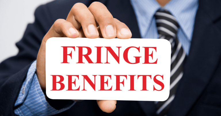 A person is holding a note with "FRINGE BENEFITS" written on it. Get expert advice on tax implications of fringe benefits from our tax accountants.