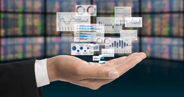 A hand holding and presenting financial data analysis results and displays floating in the air. Our accounting firm in Sydney offers audit and assurance services to ensure that your business is compliant with all relevant regulations and standards.