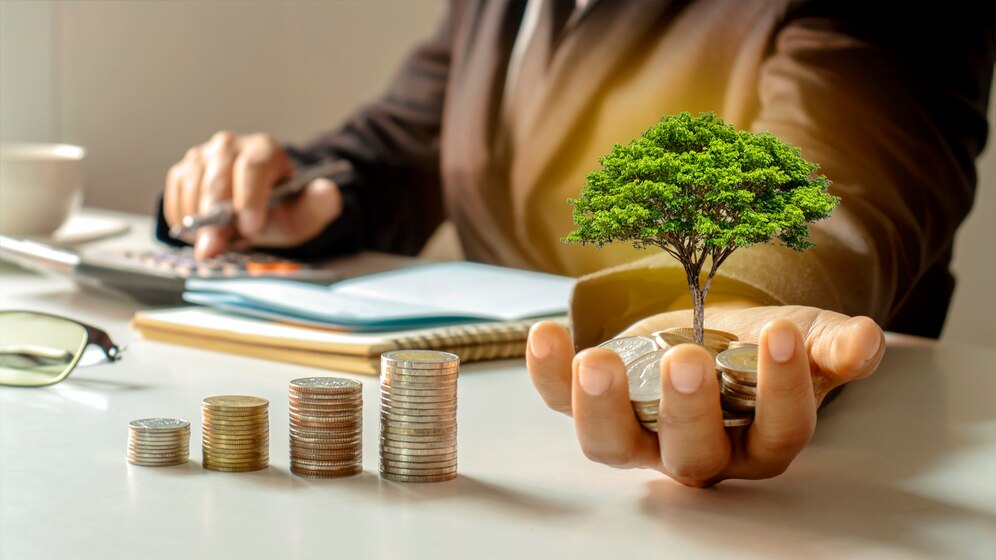 Coins and trees growing from the hands of a businessman considering his smsf investment