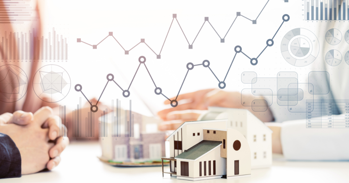 A group of people gathered in a meeting room with miniature houses on the table and financial data analysis symbols as watermarks. Contact our accounting firm in Sydney for expert advice on real estate investments and financial management.