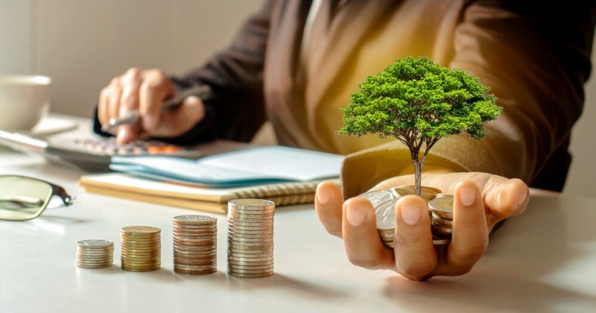 tree-that-grows-from-money-hands-businessman_104677-360